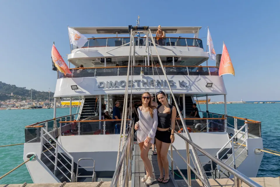 Two guests jumping from the yacht into the sea